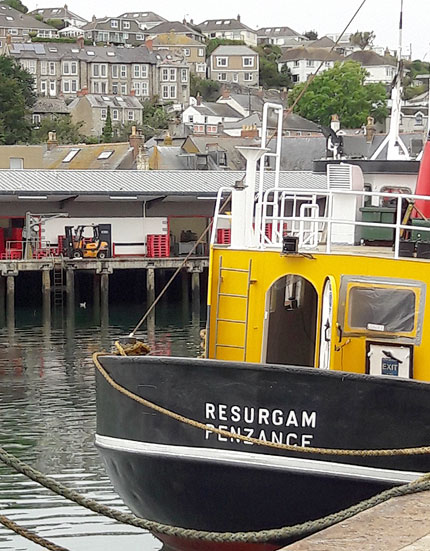 Newlyn Harbour, with Sea View Cottage in the background.