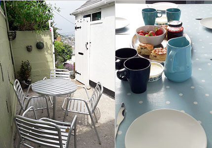 Sea View Cottage back yard and a cream tea in the dining room.